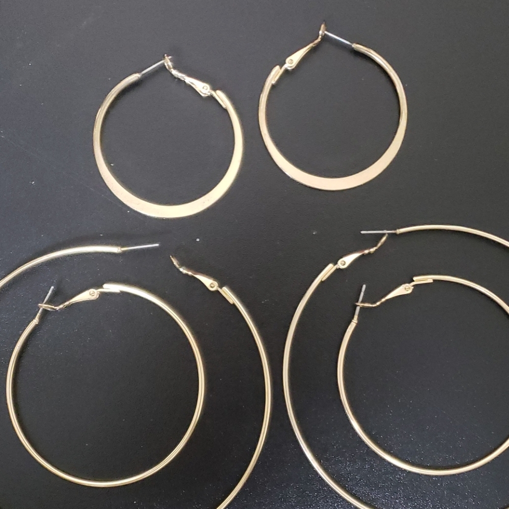 Various sizes of gold hoops